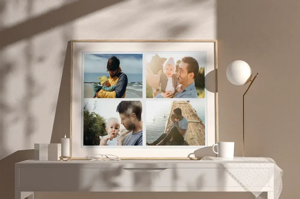 Gerahmte Fotocollage mit vier Vater-Kind-Fotos auf einer sonnigen Kommode, eine Geschenkidee zum Vatertag