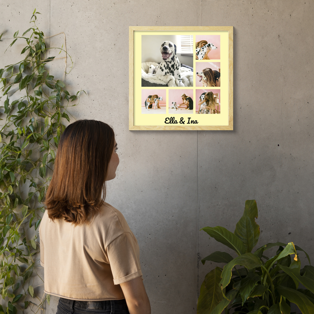 Quadratische Hunde-Fotocollage mit Namen im hellen Holzrahmen an einer Betonwand zwischen grünen Pflanzen